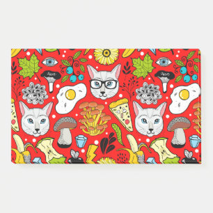 Cat and egg on red post-it notes