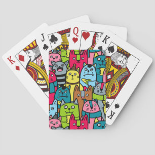 Cat and kittens playing cards