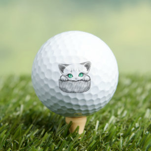 Cat Cute and Playful peaking from a Pocket Golf Balls