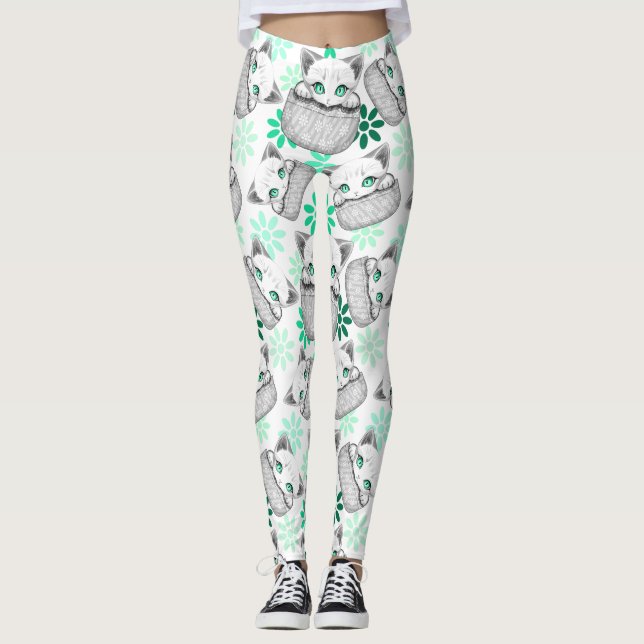 Cat Cute and Playful peaking from a Pocket Leggings (Front)