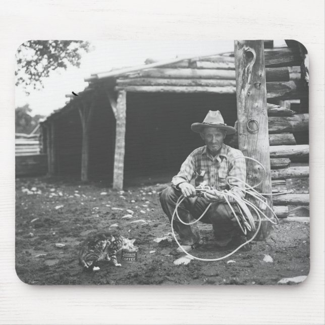 Cat eating out of a coffee can mouse mat (Front)