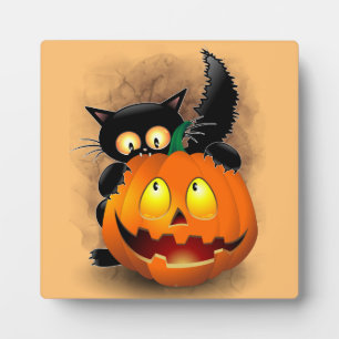 Cat Fun Halloween Character biting a Pumpkin Plaque