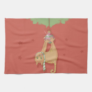Cat hanging on christmas ball tea towel