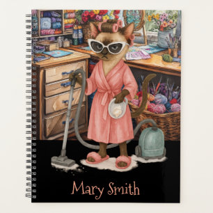 Cat is cleaning in handicraft room for cat lovers planner