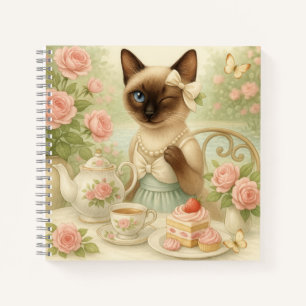 Cat is having afternoon tea in garden notebook