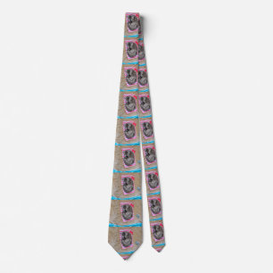 Cat lay on the beach tie