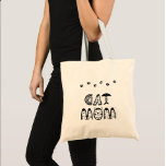 Cat Mom Tote Bag<br><div class="desc">This Cat Mom tote bag is designed for cat owners who love their feline friends like they are their own children. This bag is not only functional but also make for great gifts for any cat lover in your life. It’s a thoughtful and practical gift.</div>