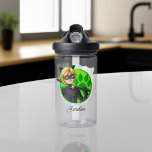 Cat Noir Green Badge Water Bottle<br><div class="desc">Cat Noir might have the power of bad luck, but we consider ourselves extremely fortunate to have him on Zazzle’s officially licensed Miraculous store. As a student of Miss Bustier's class, Adrien is reserved, studious, and sheltered; but as his alter ego Cat Noir, Adrien Agreste is witty, confident, and flirtatious...</div>