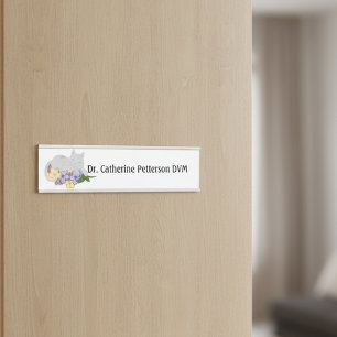 Cat On A Bed Of Flowers For Veterinarians Door Sign
