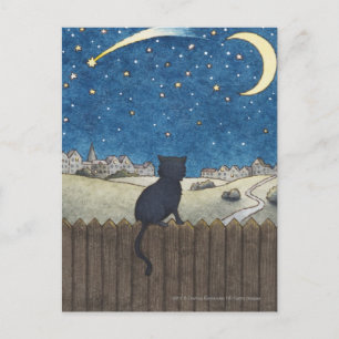 Cat on a fence looking at night sky above city postcard