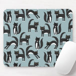 Cat Pattern Blue Mouse Mat<br><div class="desc">Cute black and white tuxedo cats going about their business. A fun pattern on a mid teal background,  perfect for animal and pet lovers. Cats love a mouse.  Original art by Nic Squirrell.</div>