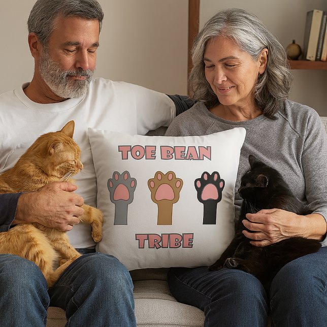 Cat Paws Toe Bean Tribe Cushion (A throw pillow with three cat paws and the words toe bean tribe.)