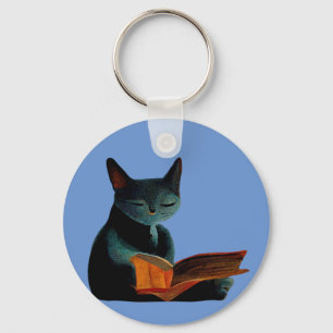 Cat reading a book key ring
