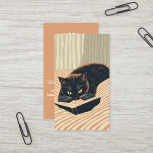 cat reading in bed business card