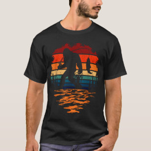Cat rides fish in blue sky T-Shirt