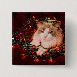 Cat sitting on a ball of Christmas lights. 15 Cm Square Badge
