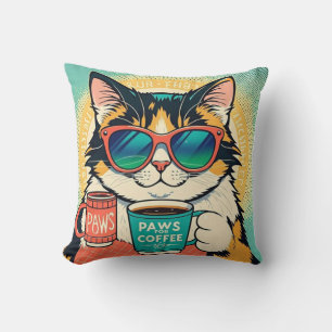 Cat wearing oversized sunglasses, holding a coffee cushion