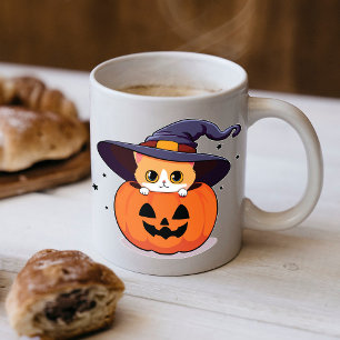 Cat with witch hat in Halloween Jack-O-Lantern Coffee Mug