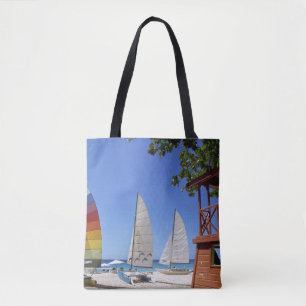 Catamarans And Lifeguard Stand On Beach Tote Bag