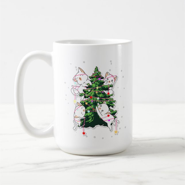 cats climbing and decorating a Christmas tree  Coffee Mug (Left)