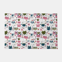Cats faces muted warm green teal pink pattern