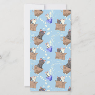 Cats in box and milk drops on blue