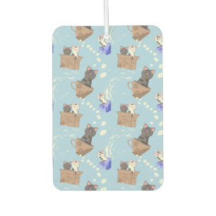 Cats in box and milk drops on blue car air freshener