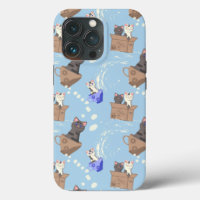 Cats in box and milk drops on blue