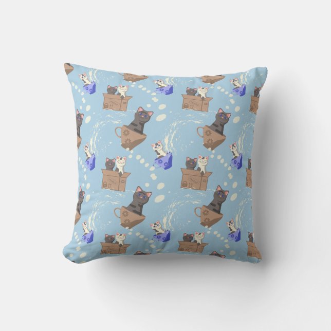 Cats in box and milk drops on blue cushion (Front)