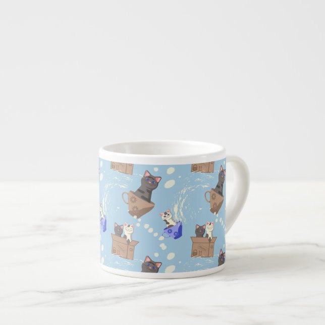 Cats in box and milk drops on blue espresso cup (Front Right)