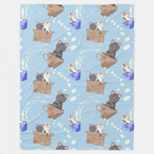Cats in box and milk drops on blue fleece blanket