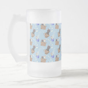 Cats in box and milk drops on blue frosted glass beer mug