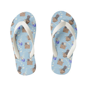 Cats in box and milk drops on blue kid's flip flops