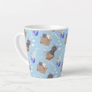 Cats in box and milk drops on blue latte mug