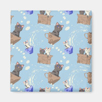 Cats in box and milk drops on blue
