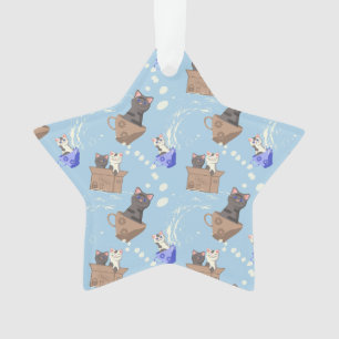 Cats in box and milk drops on blue ornament