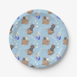 Cats in box and milk drops on blue paper plate