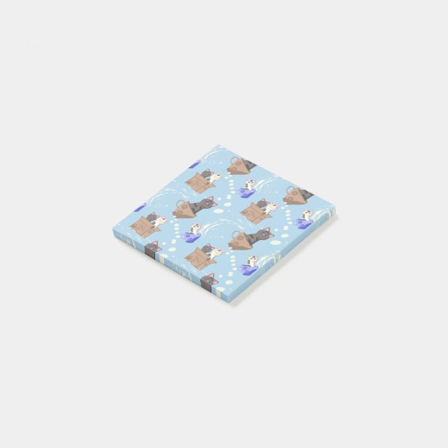 Cats in box and milk drops on blue post-it notes (Angled)