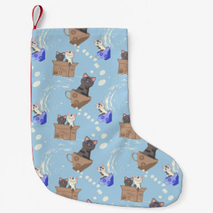 Cats in box and milk drops on blue small christmas stocking