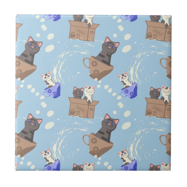Cats in box and milk drops on blue tile (Front)