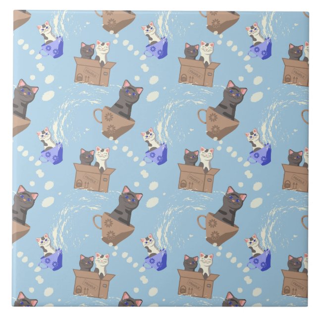 Cats in box and milk drops on blue tile (Front)