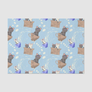 Cats in box and milk drops on blue tissue paper