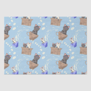 Cats in box and milk drops on blue tissue paper