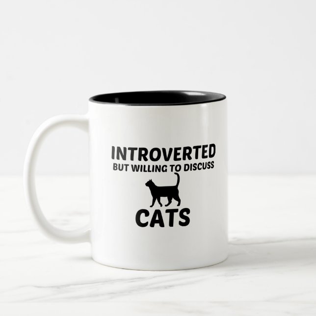CATS INTROVERTED BUT WILLING TO DISCUSS Two-Tone COFFEE MUG (Left)