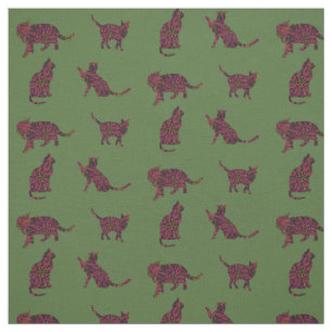 Cats on green fabric