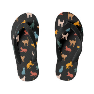 Cats on the black kid's flip flops