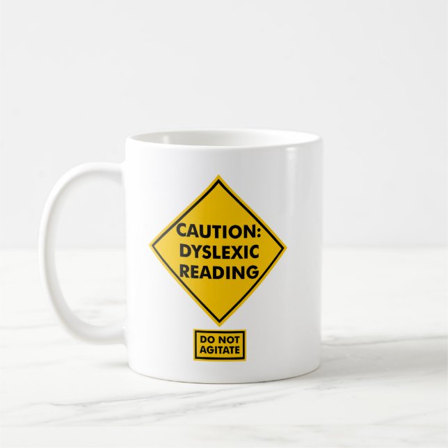 Caution: Dyslexic Reading Coffee Mug (Left)