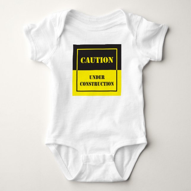 caution under construction baby bodysuit (Front)