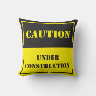 caution under construction sign cushion