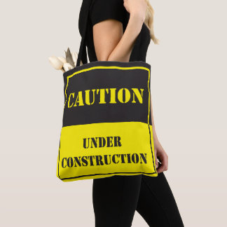 caution under construction sign tote bag